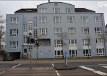 Apartment building exterior at GQ Deluxe Apartments